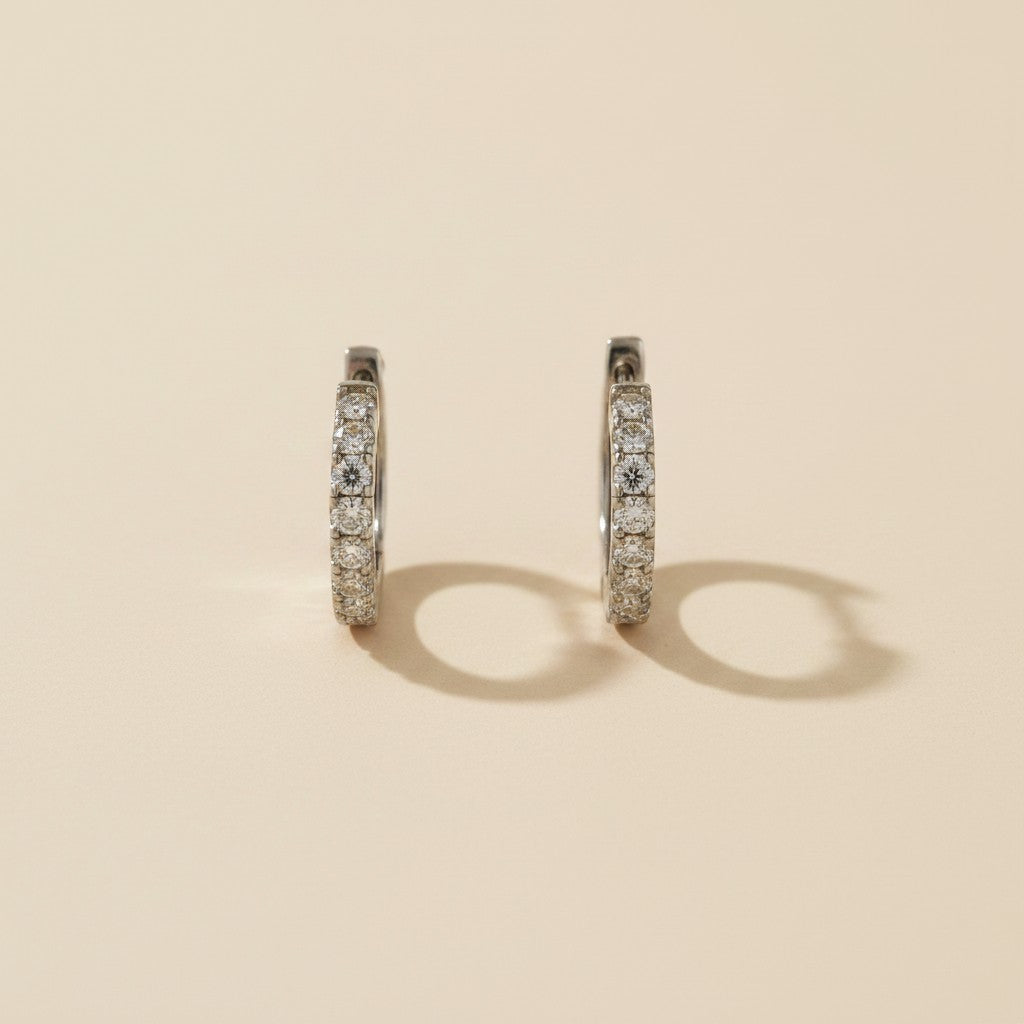 💎 .925 Sterling Silver Moissanite Hoop Earrings — 16 Certified Stones. 0.48ct Per Ear. The Hoop That Earns Its Brilliance.