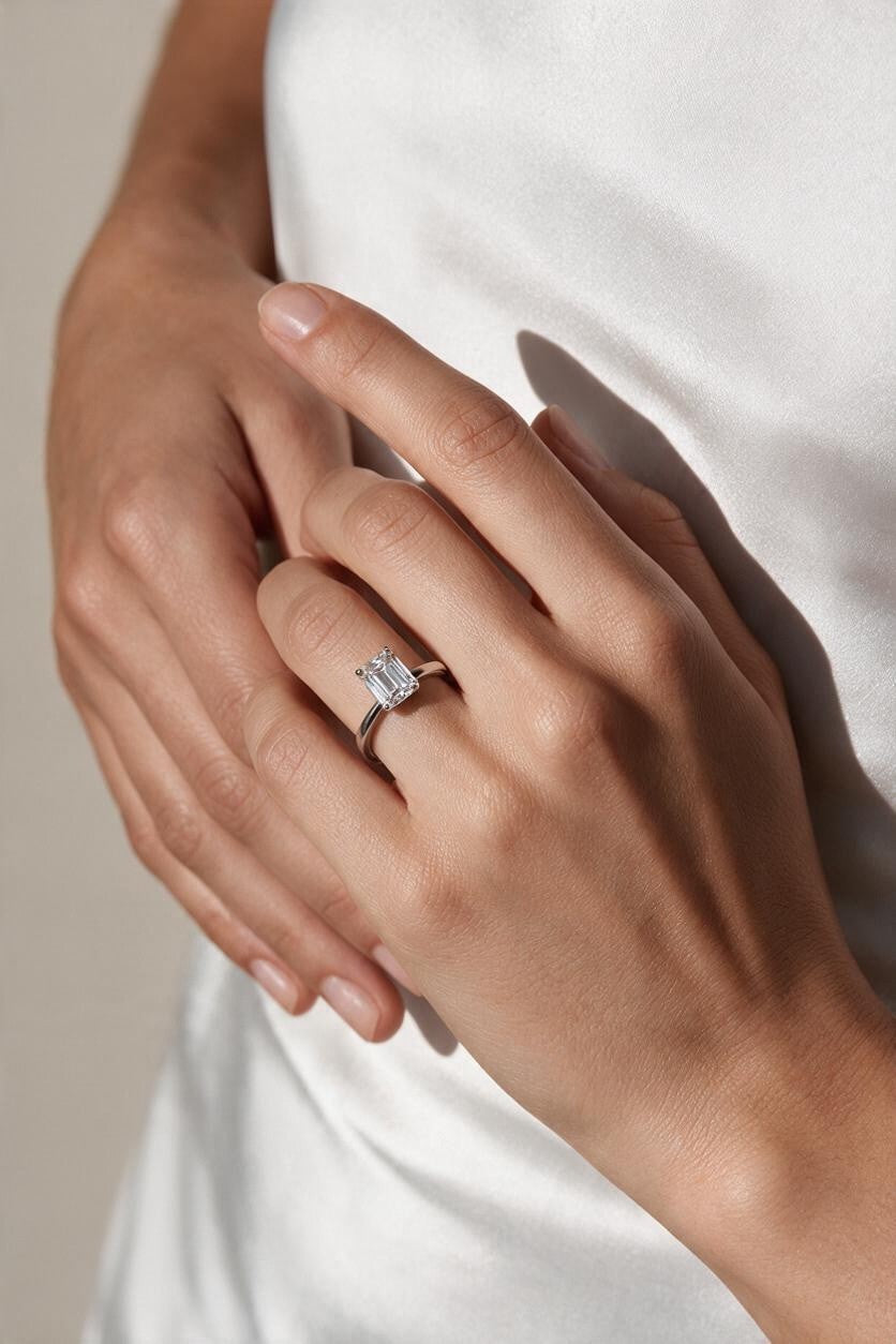 .925 Sterling Silver Rhodium Plated Moissanite Emerald Cut Solitaire Ring