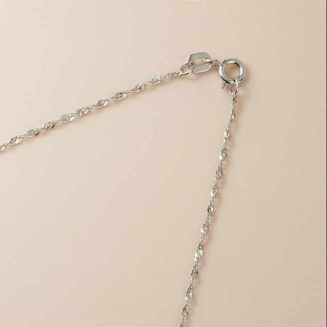 Sterling Silver Rhodium-Plated Singapore Chain — Where Light Meets the Art of the Twist