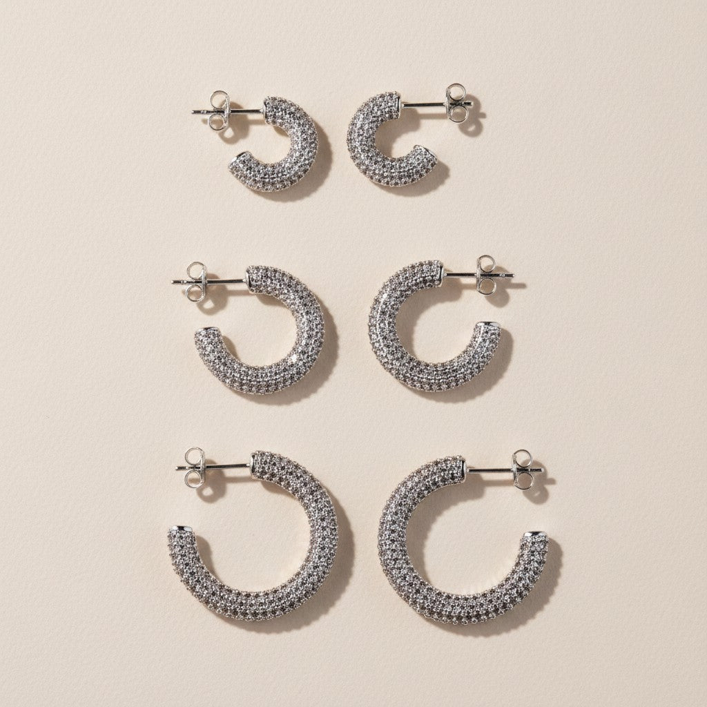 ✨ Iced C-Hoop Earrings — Full Micro CZ Coverage. Three Sizes. Two Metals. One Continuous Sparkle.