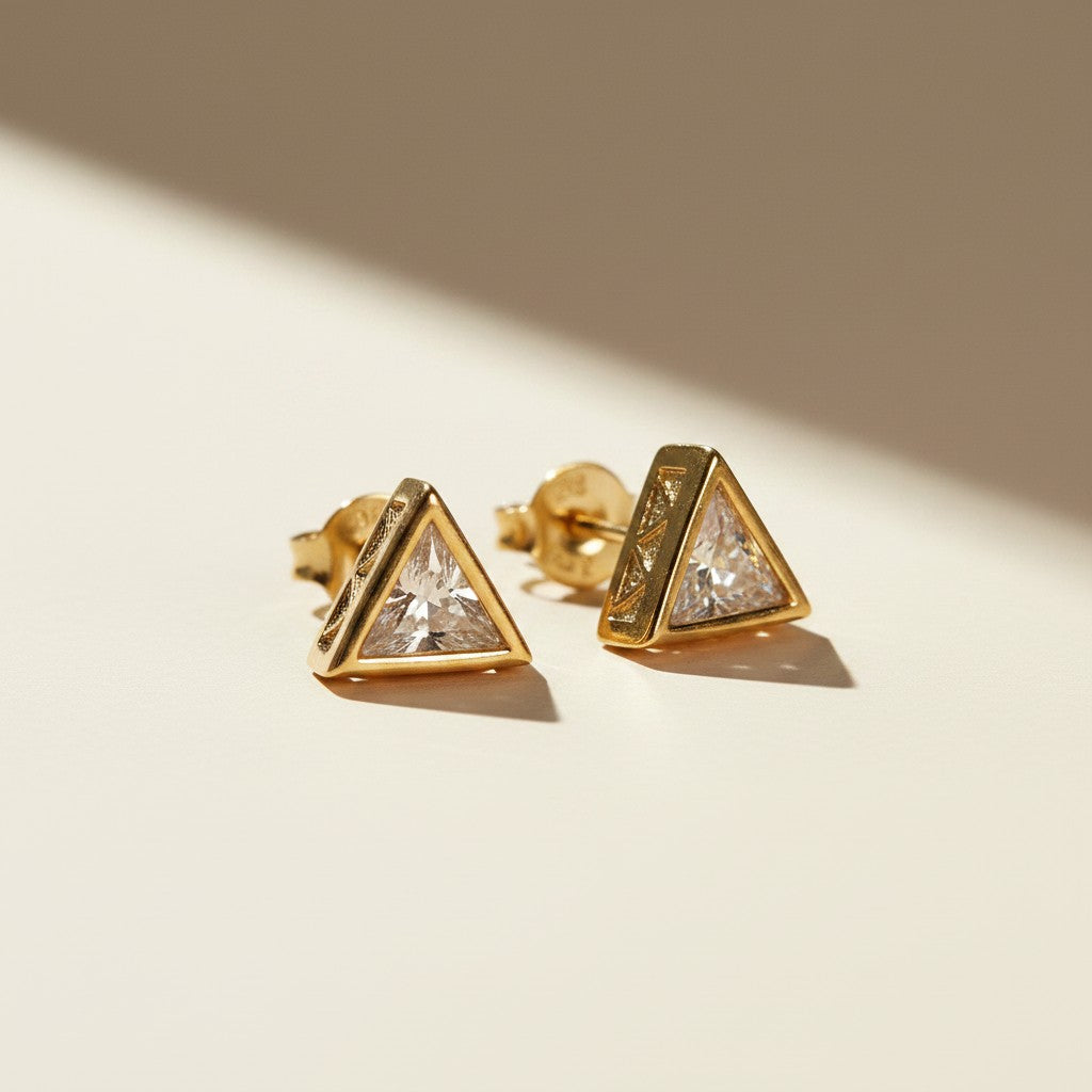 ✨ 18k Gold Filled Triangle CZ Stud Earrings — One Stone. The Perfect Center. The Most Precise Geometry.