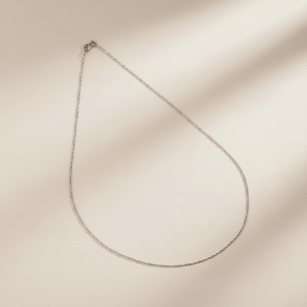 Sterling Silver Rhodium-Plated Singapore Chain — Where Light Meets the Art of the Twist