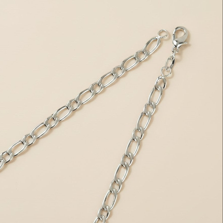 Sterling Silver 3.9mm Figaro Chain — Round Meets Oval. The Cleanest Rhythm in Silver.