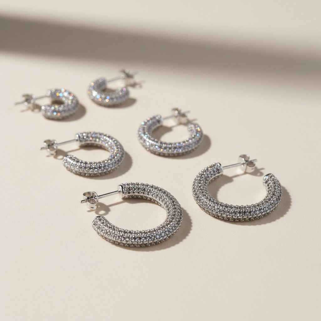 ✨ Iced C-Hoop Earrings — Full Micro CZ Coverage. Three Sizes. Two Metals. One Continuous Sparkle.
