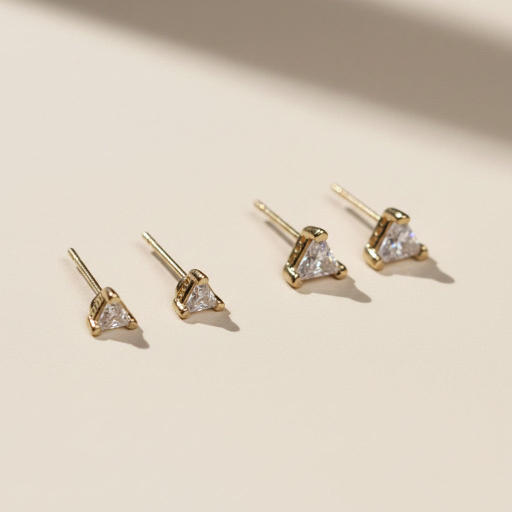 ✨ 18k Gold Filled CZ Triangle Stud Earrings — Three Sides. One Stone. Geometric Edge.