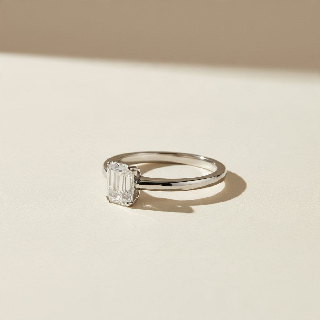 .925 Sterling Silver Rhodium Plated Moissanite Emerald Cut Solitaire Ring