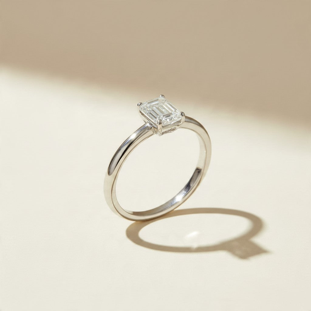 .925 Sterling Silver Rhodium Plated Moissanite Emerald Cut Solitaire Ring