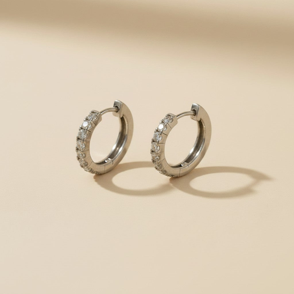 💎 .925 Sterling Silver Moissanite Hoop Earrings — 16 Certified Stones. 0.48ct Per Ear. The Hoop That Earns Its Brilliance.