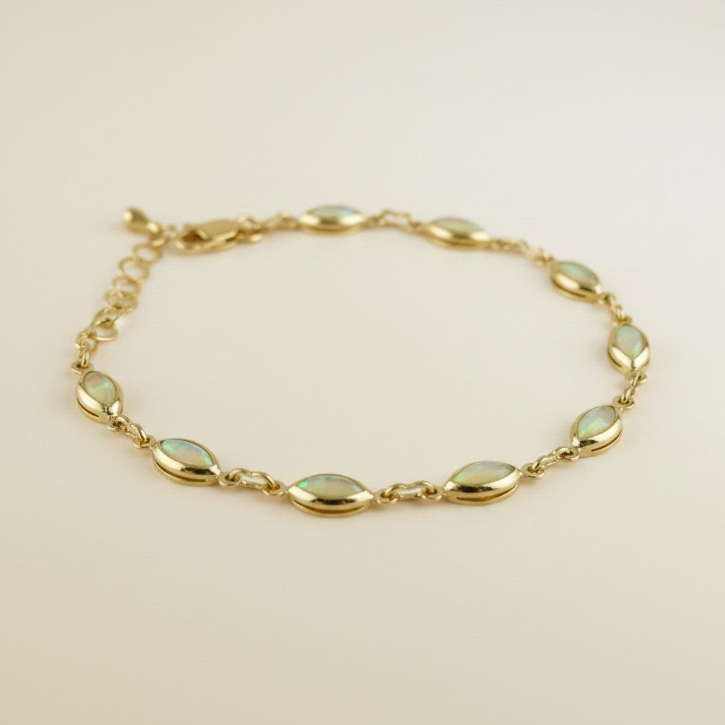 ✨ 18k Gold Filled Opal Ellipse Bracelet — Ten Stones. Ten Fires. One Wrist That Can't Be Ignored.
