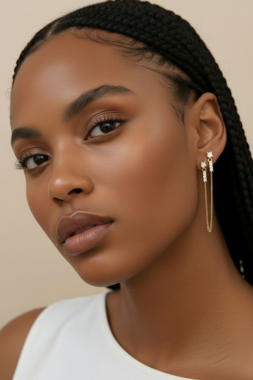 ✨ 18k Gold Filled CZ Double Piercing Chain Earrings — Two Studs. One Chain. The Ear Stack Elevated.