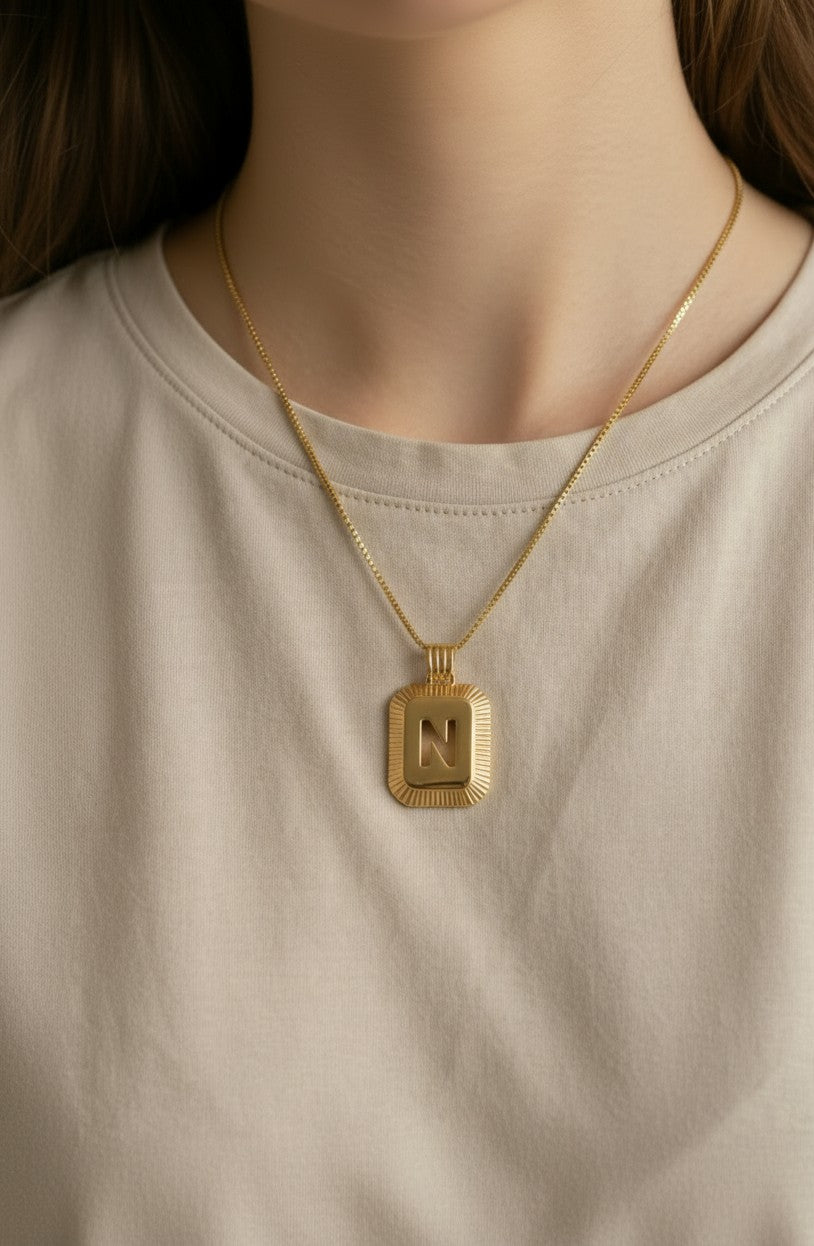 18k Gold Filled Diamond-Cut Initial Pendant — Your Letter. Your Name. Worn in Gold.