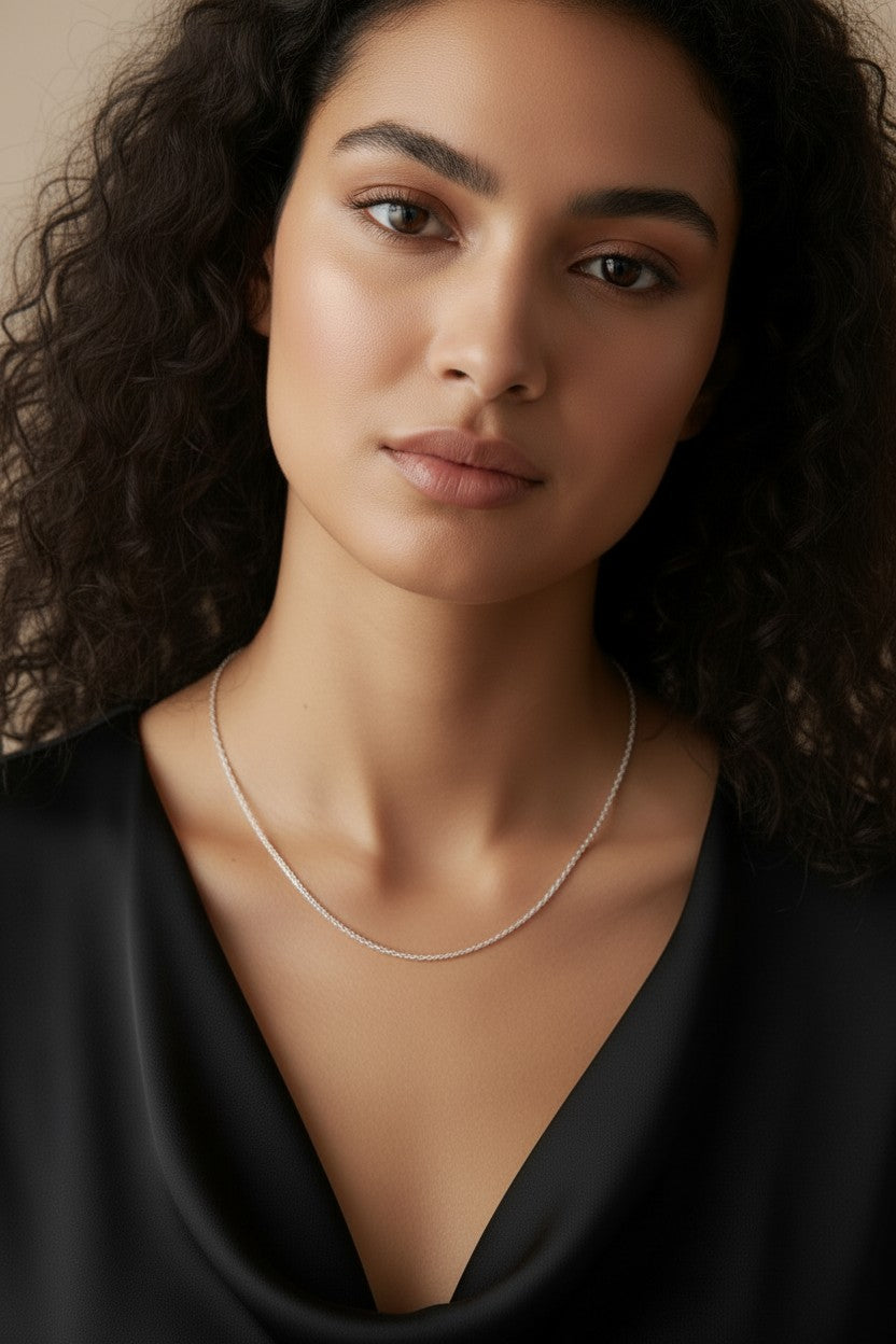 Sterling Silver Rhodium-Plated Singapore Chain — Where Light Meets the Art of the Twist