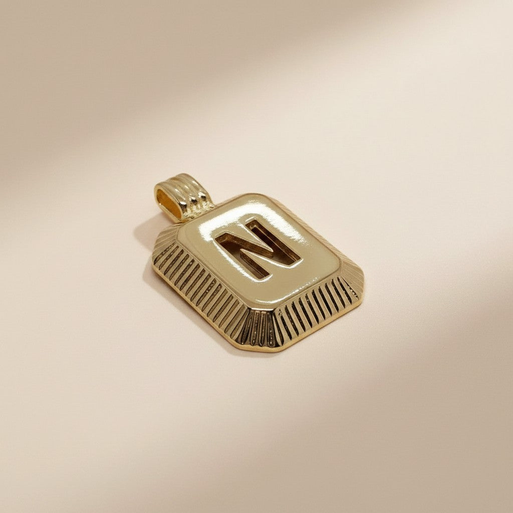 18k Gold Filled Diamond-Cut Initial Pendant — Your Letter. Your Name. Worn in Gold.