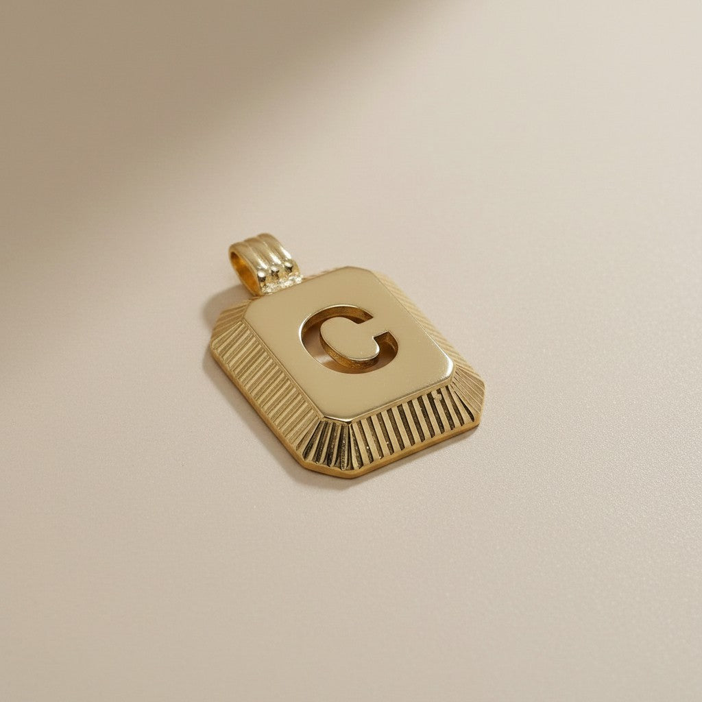 18k Gold Filled Diamond-Cut Initial Pendant — Your Letter. Your Name. Worn in Gold.