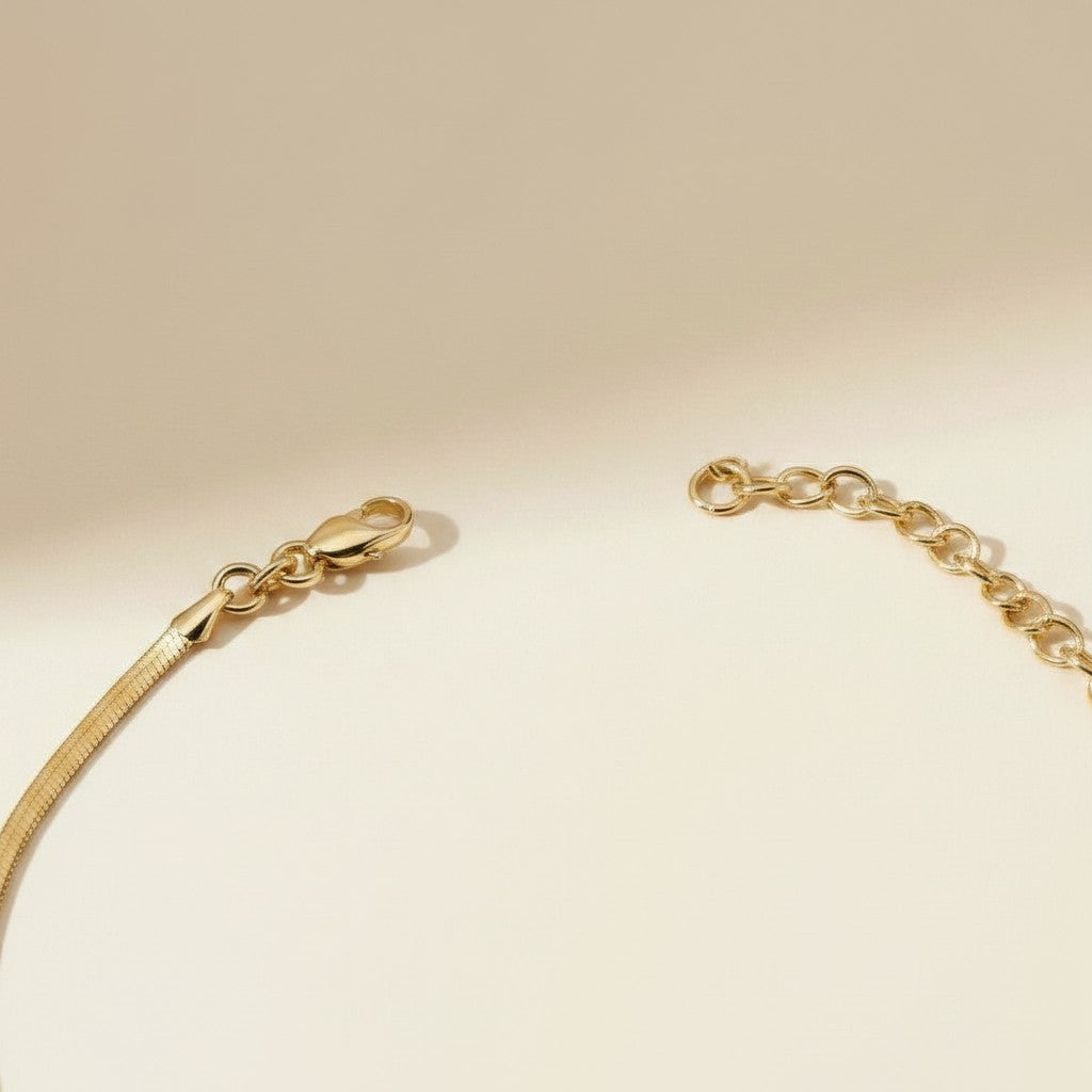 ✨ 18k Gold Filled Herringbone Chain Anklet — Flat. Fluid. Shimmering With Every Step.