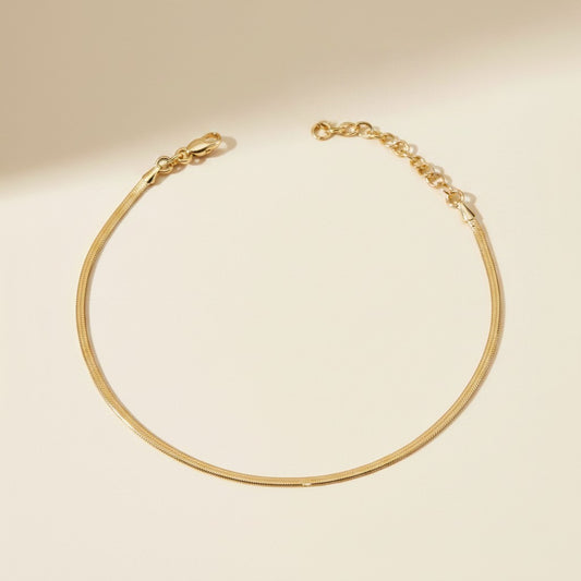 ✨ 18k Gold Filled Herringbone Chain Anklet — Flat. Fluid. Shimmering With Every Step.