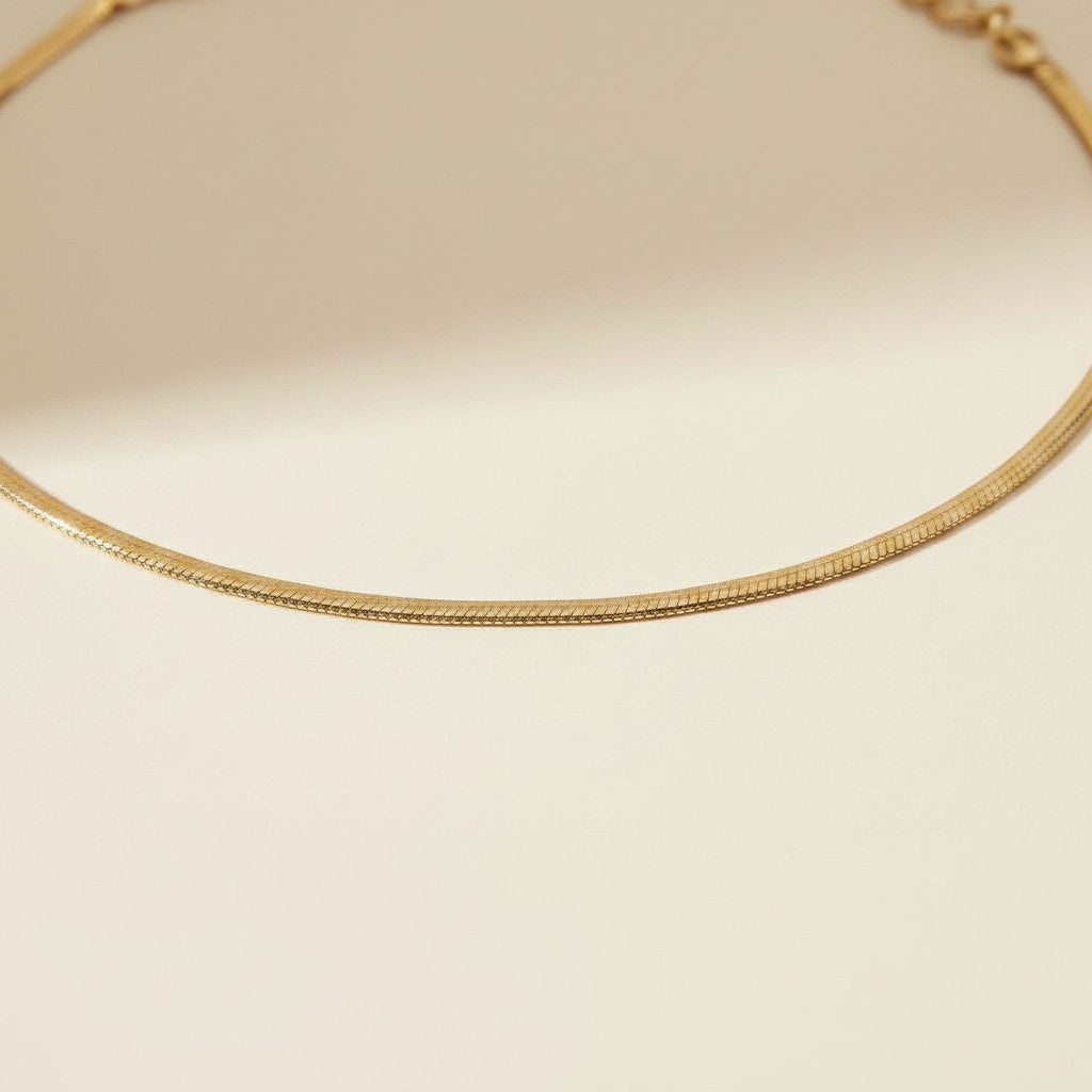 ✨ 18k Gold Filled Herringbone Chain Anklet — Flat. Fluid. Shimmering With Every Step.