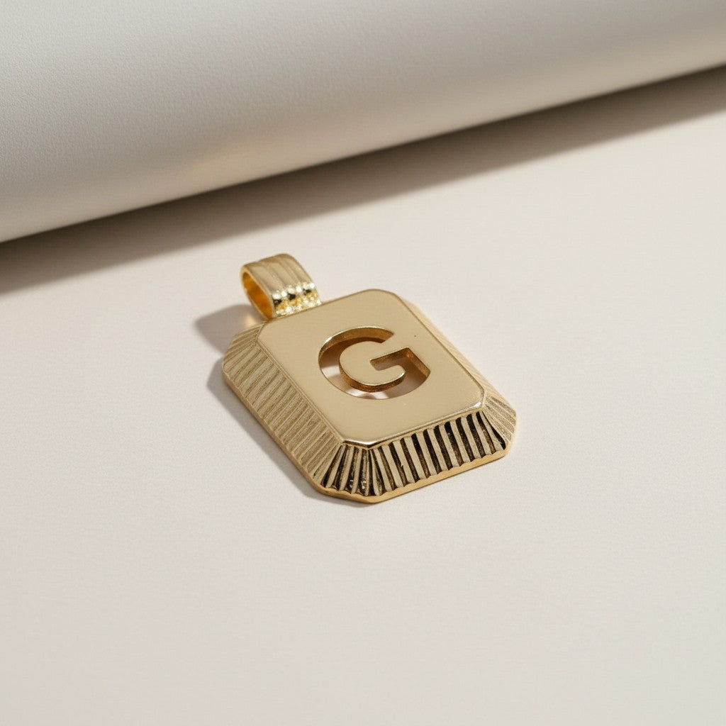 18k Gold Filled Diamond-Cut Initial Pendant — Your Letter. Your Name. Worn in Gold.