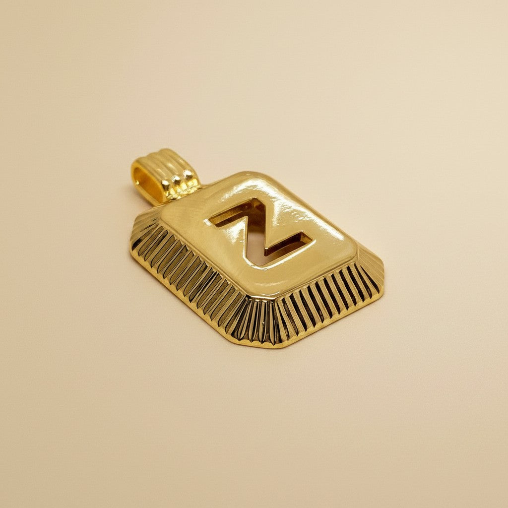 18k Gold Filled Diamond-Cut Initial Pendant — Your Letter. Your Name. Worn in Gold.