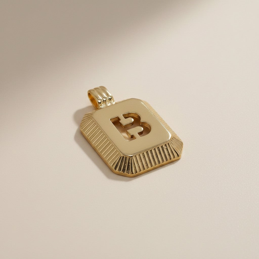 18k Gold Filled Diamond-Cut Initial Pendant — Your Letter. Your Name. Worn in Gold.