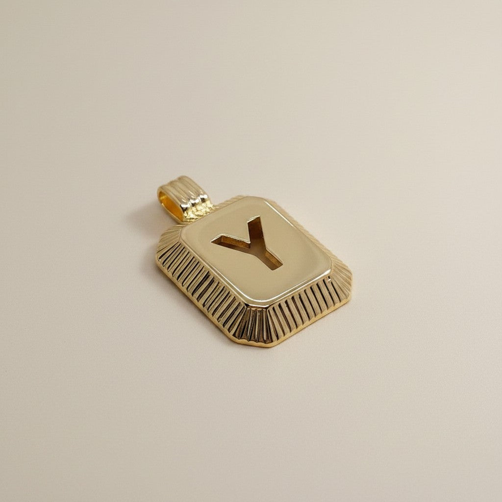 18k Gold Filled Diamond-Cut Initial Pendant — Your Letter. Your Name. Worn in Gold.