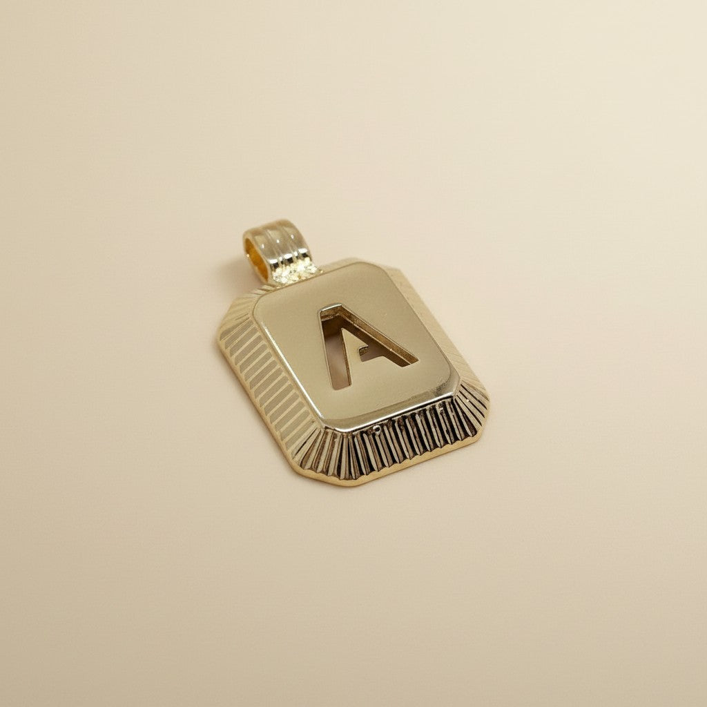 18k Gold Filled Diamond-Cut Initial Pendant — Your Letter. Your Name. Worn in Gold.