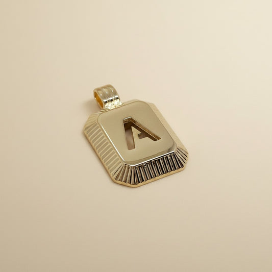 18k Gold Filled Diamond-Cut Initial Pendant — Your Letter. Your Name. Worn in Gold.