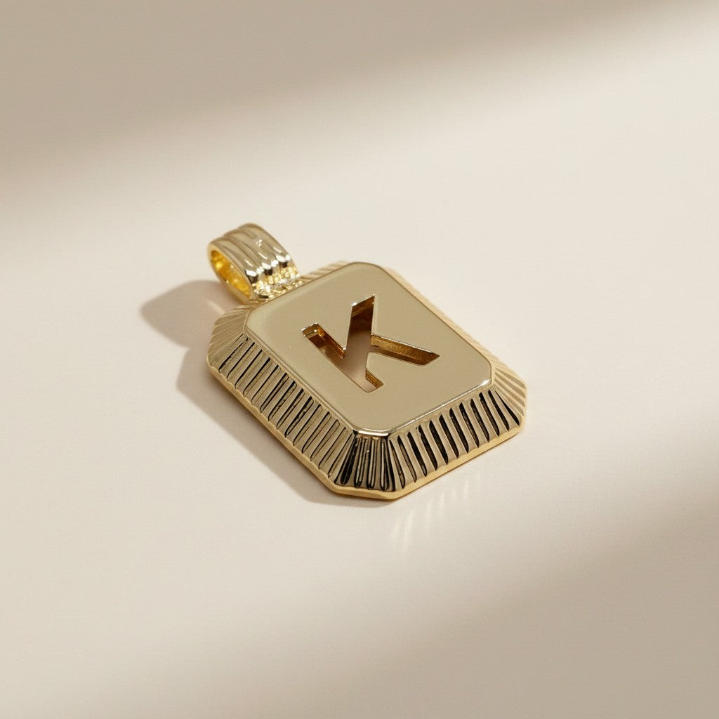 18k Gold Filled Diamond-Cut Initial Pendant — Your Letter. Your Name. Worn in Gold.
