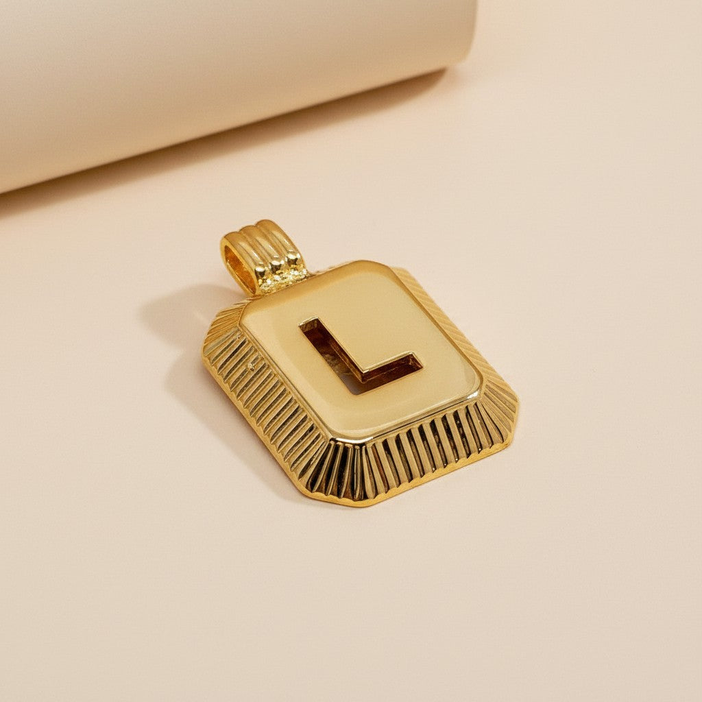 18k Gold Filled Diamond-Cut Initial Pendant — Your Letter. Your Name. Worn in Gold.