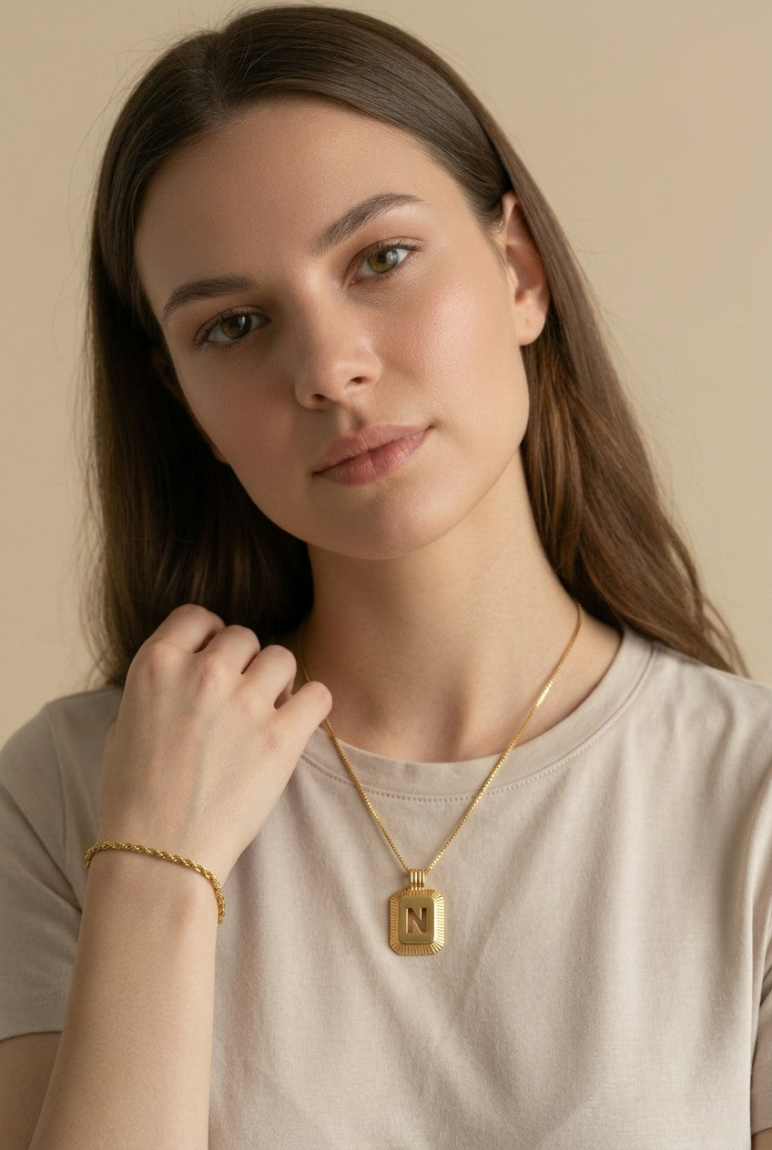 18k Gold Filled Diamond-Cut Initial Pendant — Your Letter. Your Name. Worn in Gold.